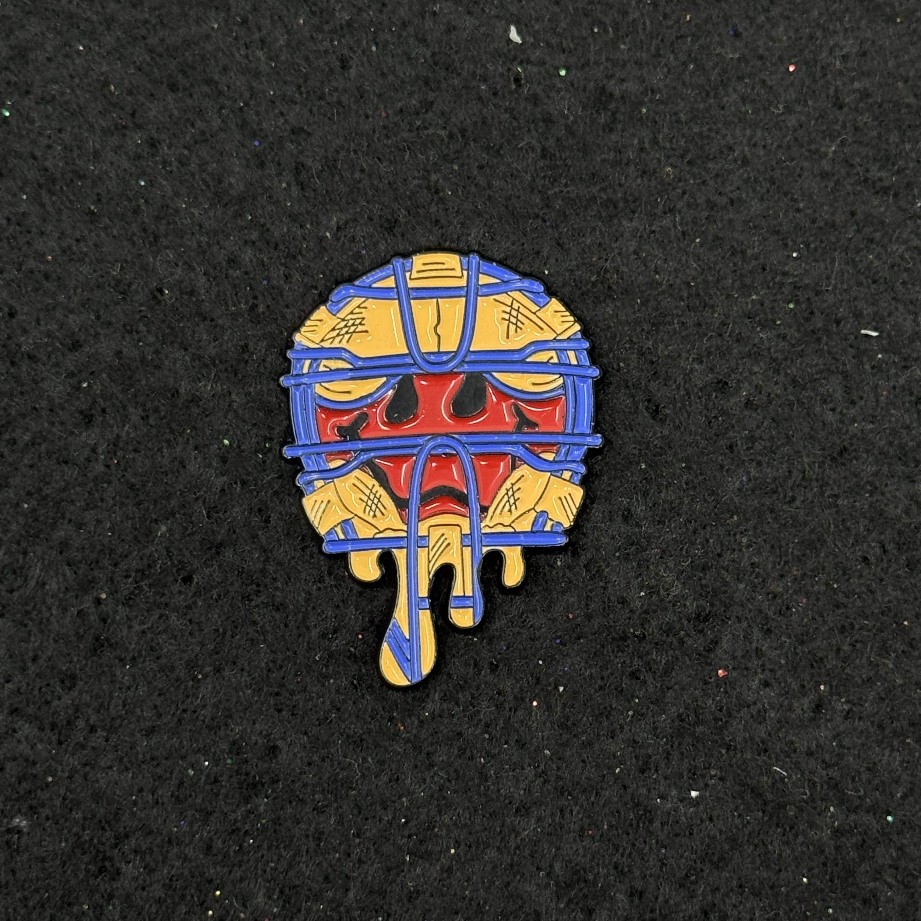 Maroon Smiley Blue Accents Umpire Mask Graphic Pin