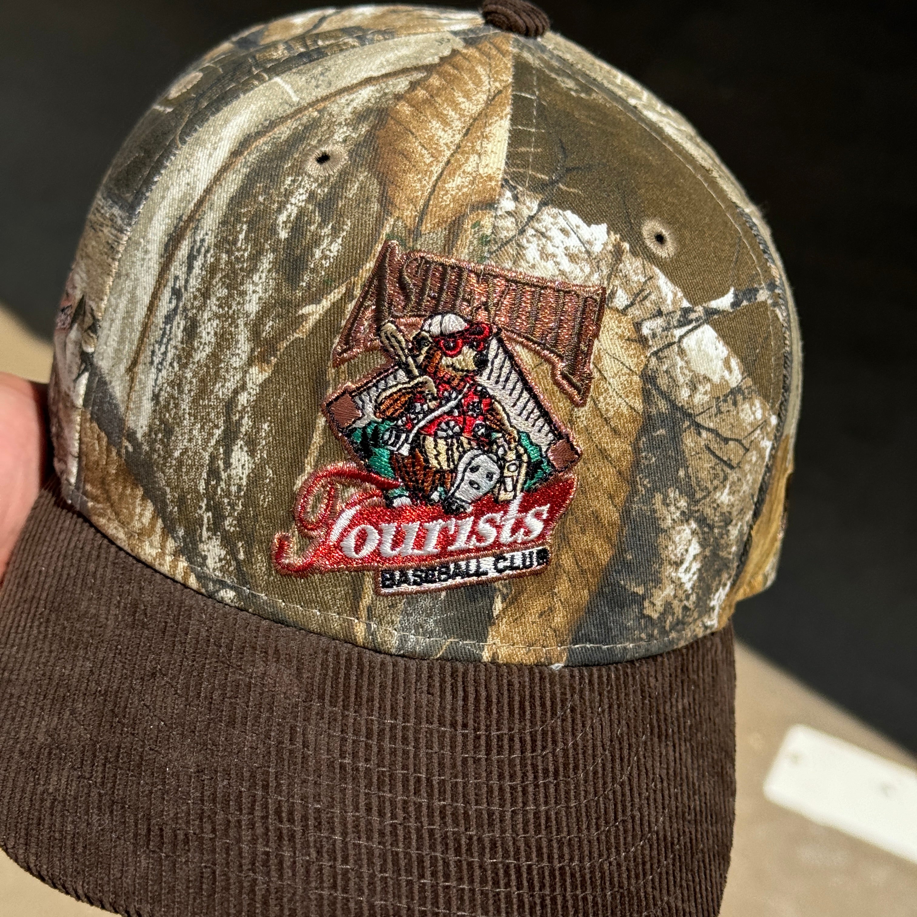 USED 3/8 Camo Realtree Asheville Tourists Minor League Corduroy New Era Fitted Hat Cap