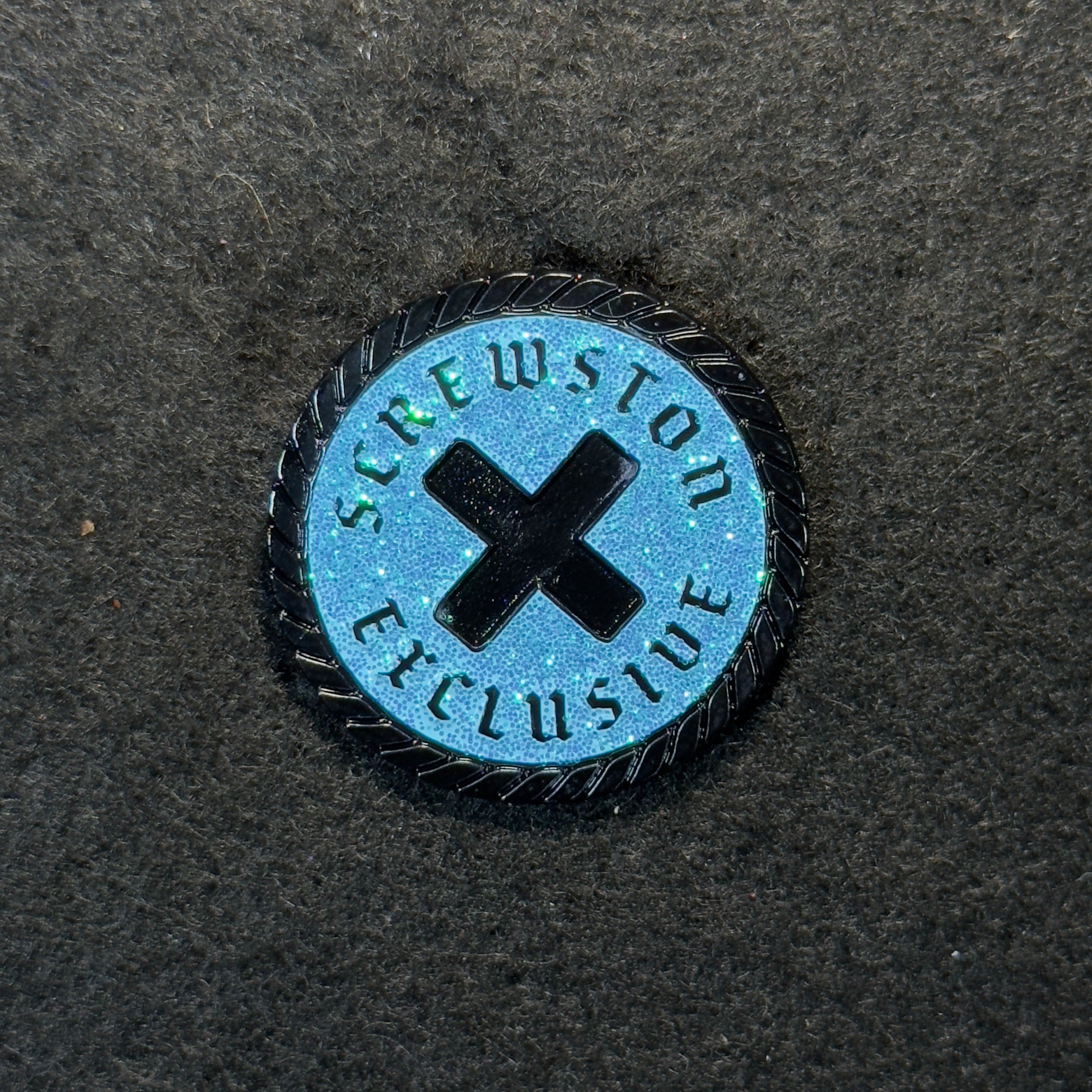 Supremo Black/Blue Screwston Exclusive Coin Pin