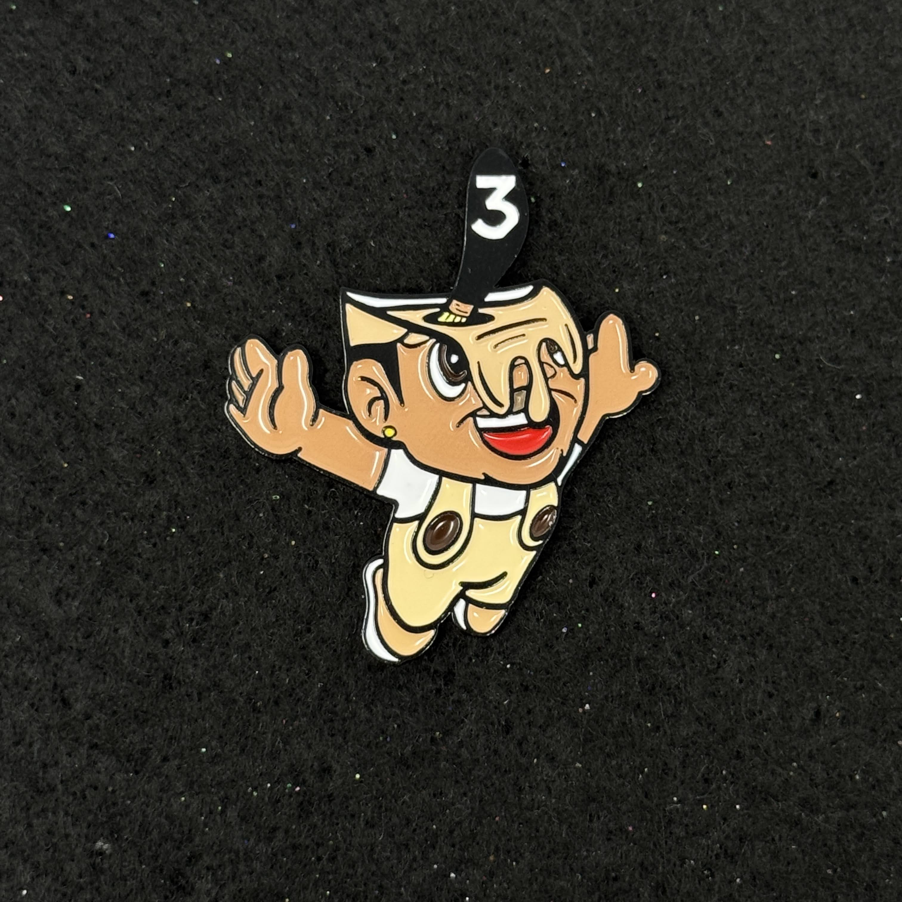 Flying Man Pain Bucket Black Plating Graphic Pin