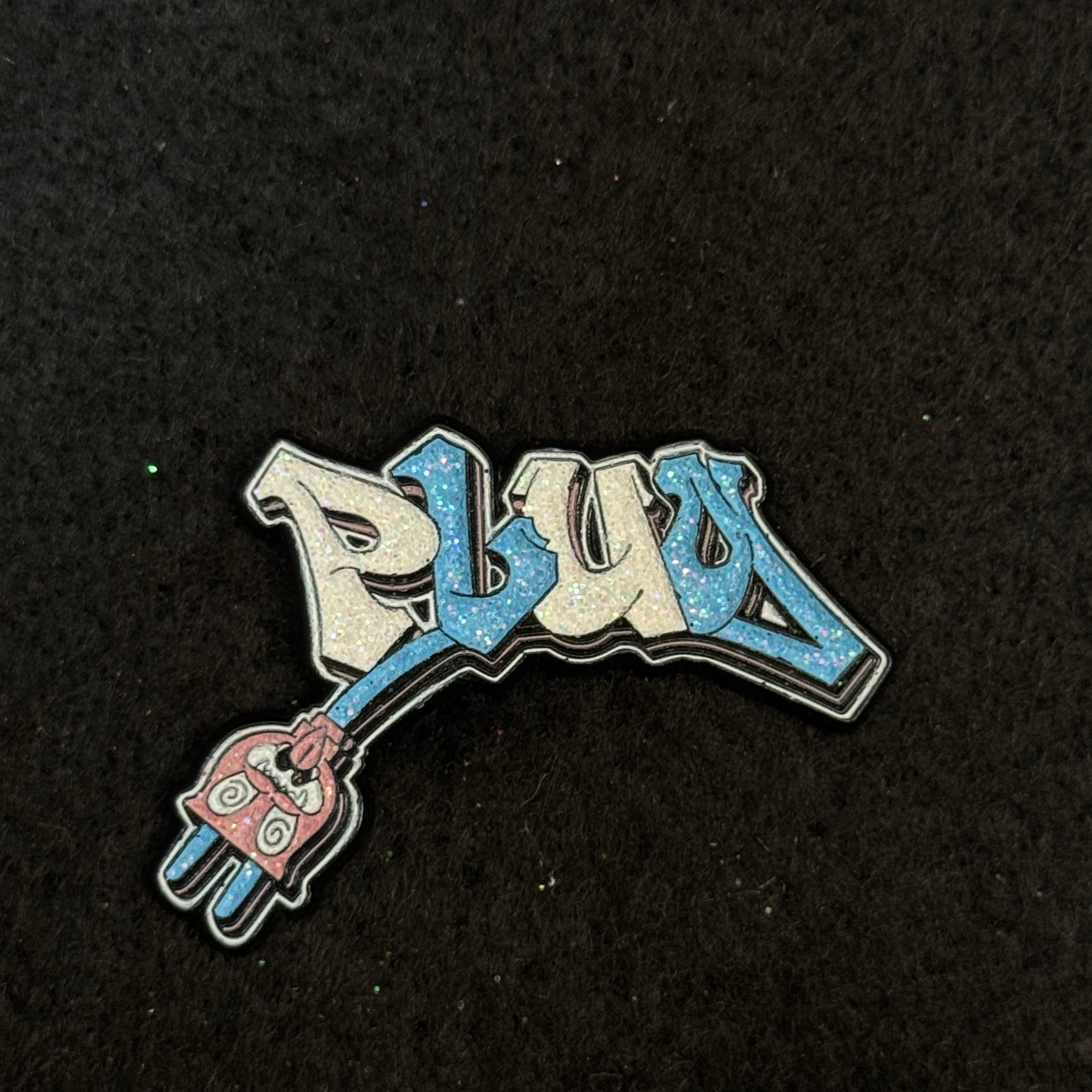 PLUG Icy Blue Black Plating Graphic Pin