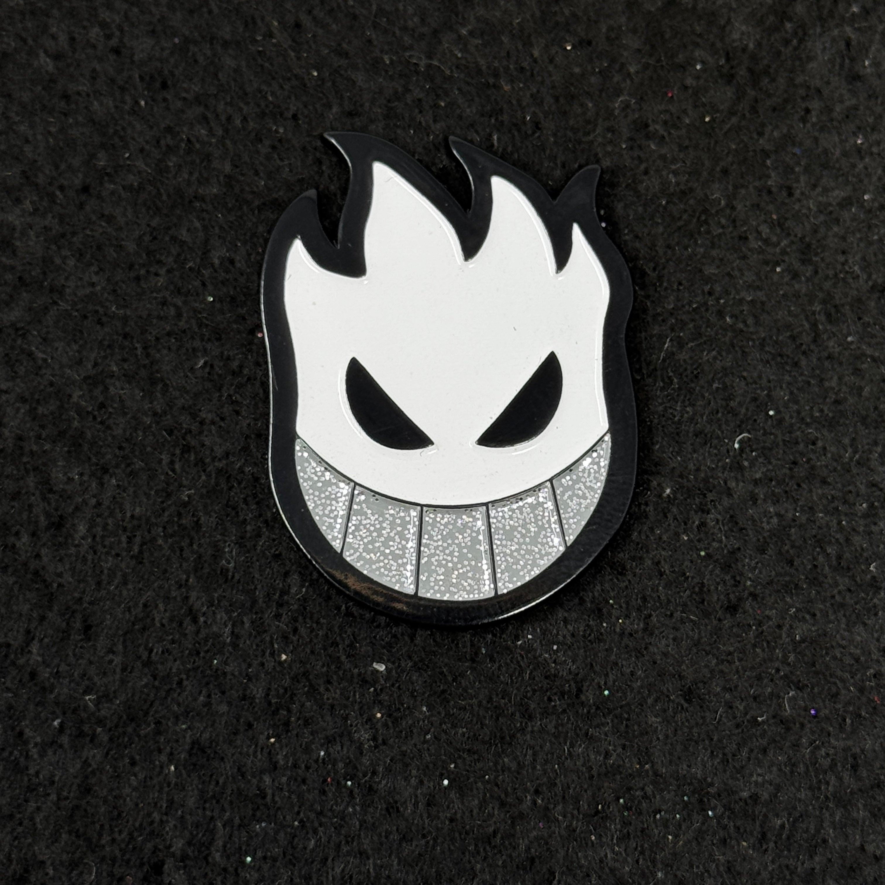 CozyBrimz White Smiling Flame face Graphic Pin